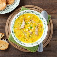 Creamy corn soup with vegetables and meat. 