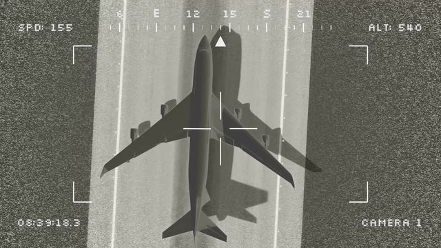 Military surveillance drone noisy footage of large airplane departing from an airport