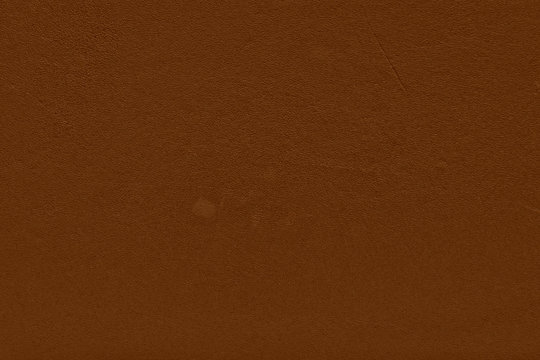 Brown leather background.