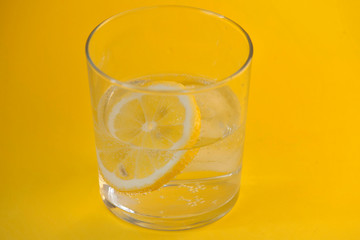 Citrus lemonade water with lemon sliced , healthy and detox water drink in summer 