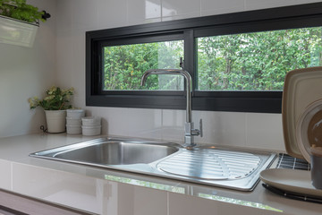 sink with faucet in kitchen room