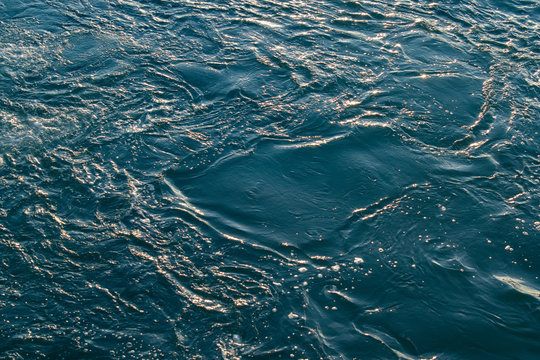 Blue and turquoise water with irregular wave structure