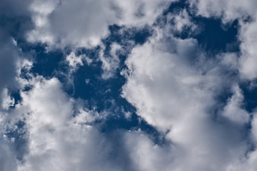 Air clouds in the blue sky. Beautiful cirrus clouds against the sky.