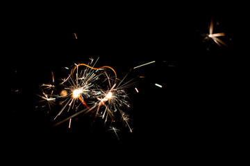 Fire sparklers on black background - Image