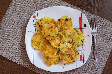 Potato pancakes with green onions. Draniki - potato fritters. The naitonal dish of Belarus, Ukraine and Russia. Potato zucchini cakes.