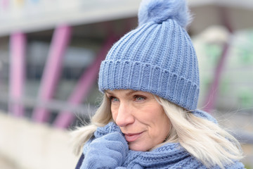 Attractive blond woman in warm winter fashion
