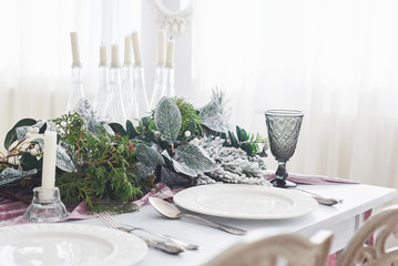 Table served for Christmas dinner in living room, close up view