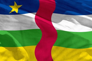 Obraz premium Waving Central African Republic flag for using as texture or background, the flag is fluttering on the wind