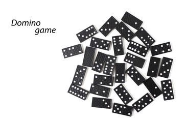 Black dominoes on white background with copy space