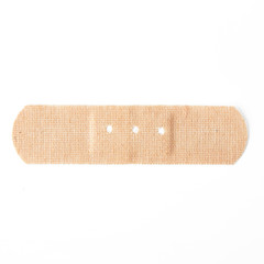 beige adhesive plaster  isolated on white background. Medical item