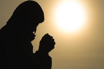 Silhouette of christian man hands praying to god, Man Pray for god blessing to wishing have a...