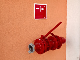 fire hydrant in the wall