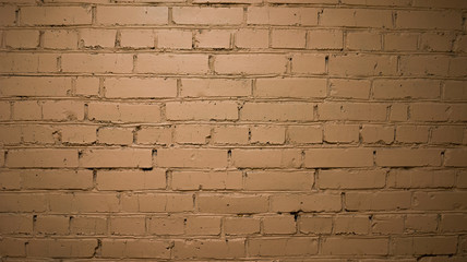 brick wall painted with brown paint