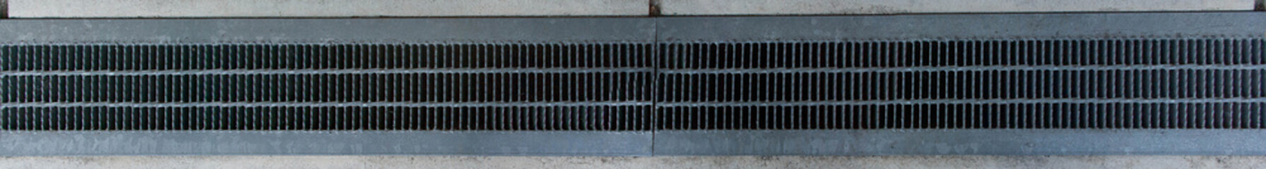 Metal Lids for Drainage on the Side of the Japanese Street 