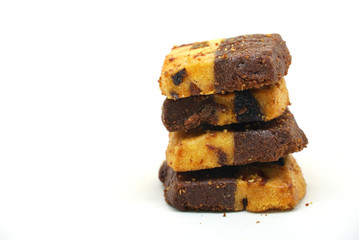 Stack of chocolate cookies on white background