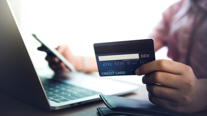 Online shopping, payment at the store, credit card, concept.