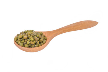 Green beans in wooden spoons on white backgrounds