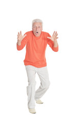 Portrait of surprised senior man on white background