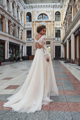 Obraz premium Beautiful delicate young woman, sexy bride in luxurious wedding dress