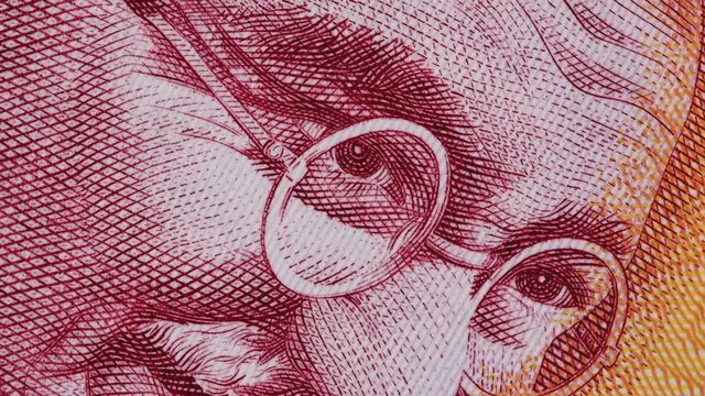 Mahatma Gandhi on India 200 rupee banknote macro slow rotating. Indian money currency bill. Stock video footage