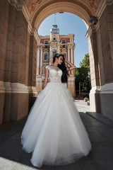 Obraz premium Beautiful sexy woman in a wedding dress in a charming castle.