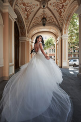 Obraz premium Beautiful sexy woman in a wedding dress in a charming castle.