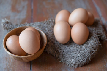Eggs in wooden bowl