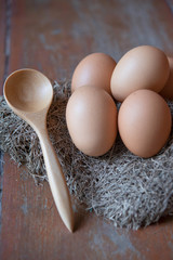 Eggs and wooden spoons
