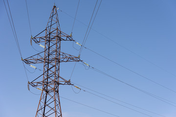 View of electrics, electric lines on the background of blue sky and good weather.