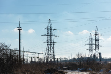 View of electrics, electric lines on the background of blue sky and good weather.
