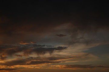 Fototapeta na wymiar dramatic sky with clouds sunset