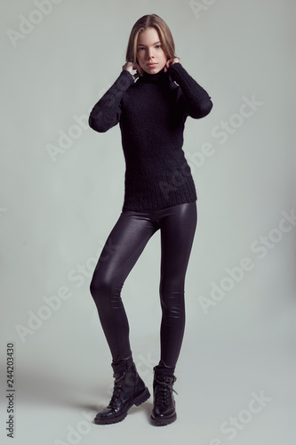 Young Fashion Model Teenage Girl Posing At Studio In Stylish
