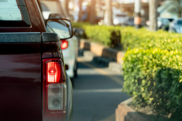 Transportation of cars on the road. Open light break waiting to release traffic signals in the intersection. Heading to travel or work. On the asphalt road.