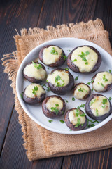 Baked mushrooms stuffed with mozzarella