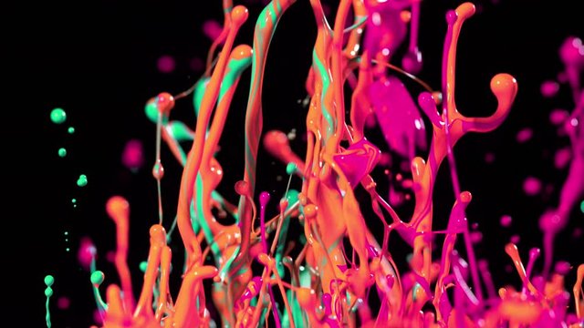 Colorful splashing paint in super slow motion. Shot with high speed cinema camera, 1000fps