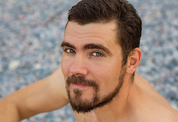 attractive caucasian man with beard closeup