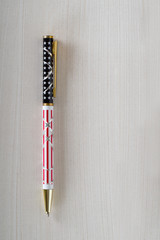 american flag pen on wood