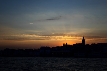 Naklejka premium Galata Tower and panorama of Istanbul during the sunset. View from the Bosporus Strait