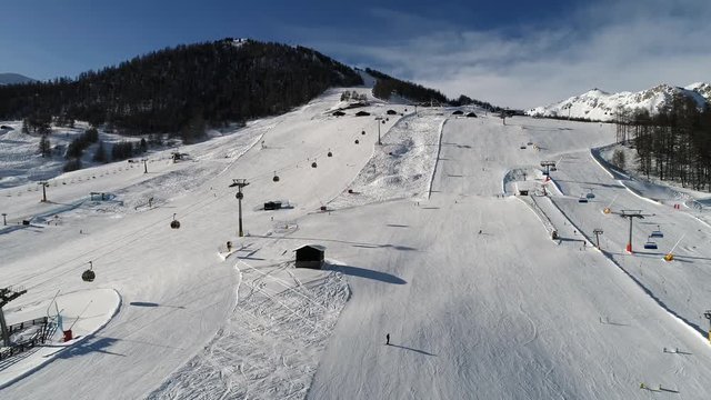 Ski lift in the ski station of Livigno, Valtellina.
Skiers on the snow