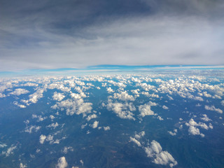 blue sky and white clouds. view from the window of the plane.