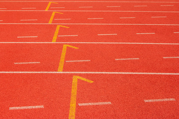 Red running track Synthetic rubber on the athletic stadium.