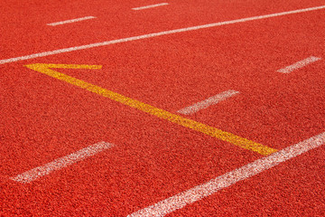 Fototapeta premium Red running track Synthetic rubber on the athletic stadium.