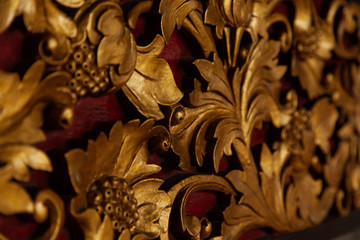 golden carved wood element