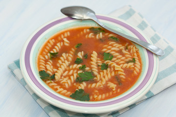 Homemade tomato soup with noodles.