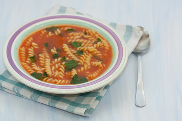 Homemade tomato soup with noodles.