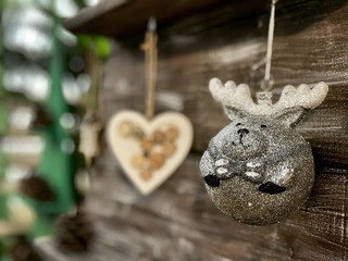 Handmade Christmas toys on the wooden planks