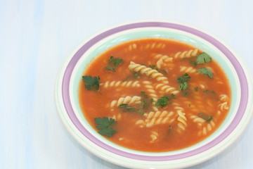 Tomato soup with noodles.
