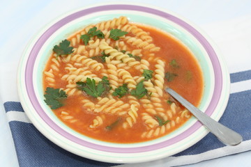 Tomato soup with noodles.