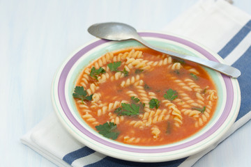 Tomato soup with noodles.