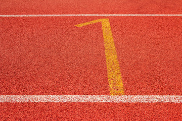 Red running track Synthetic rubber on the athletic stadium.